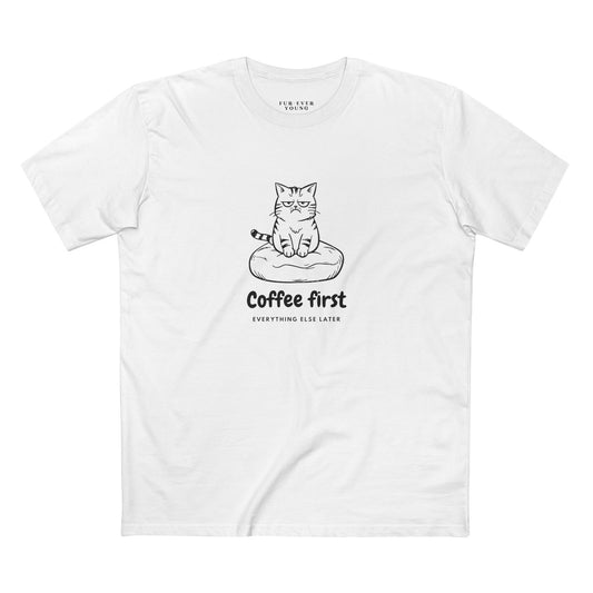 White t-shirt with a cat graphic and text 'Coffee first, everything else later' on a white background